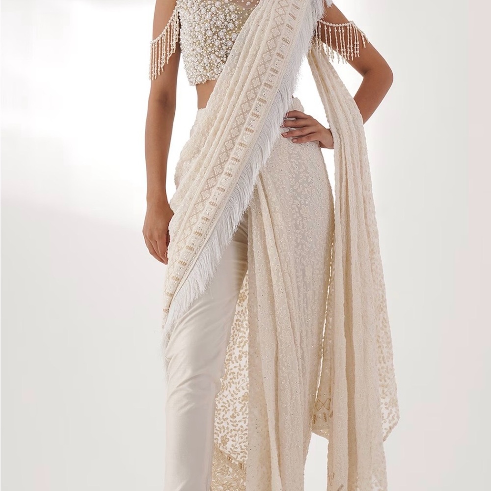 Elegant Cream Beaded Saree with Fringe Details